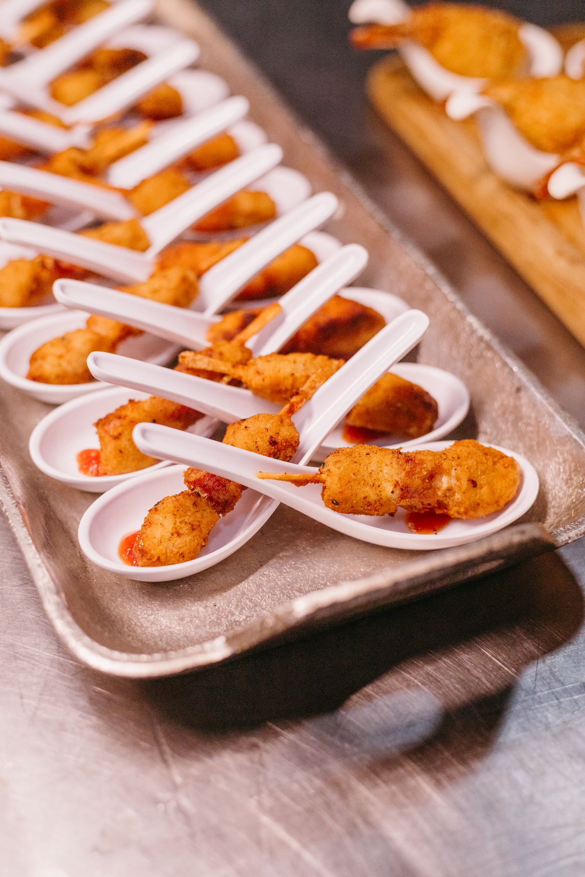 An assortment of small chops on skewers